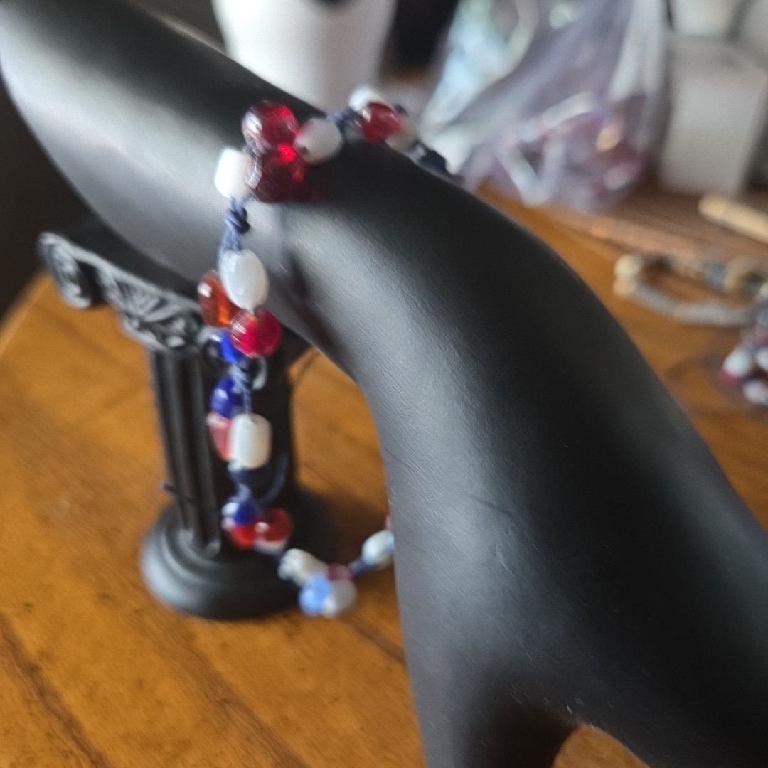Patriotic red white & blue 7 inch bracelet. Size is adjustable Tie one