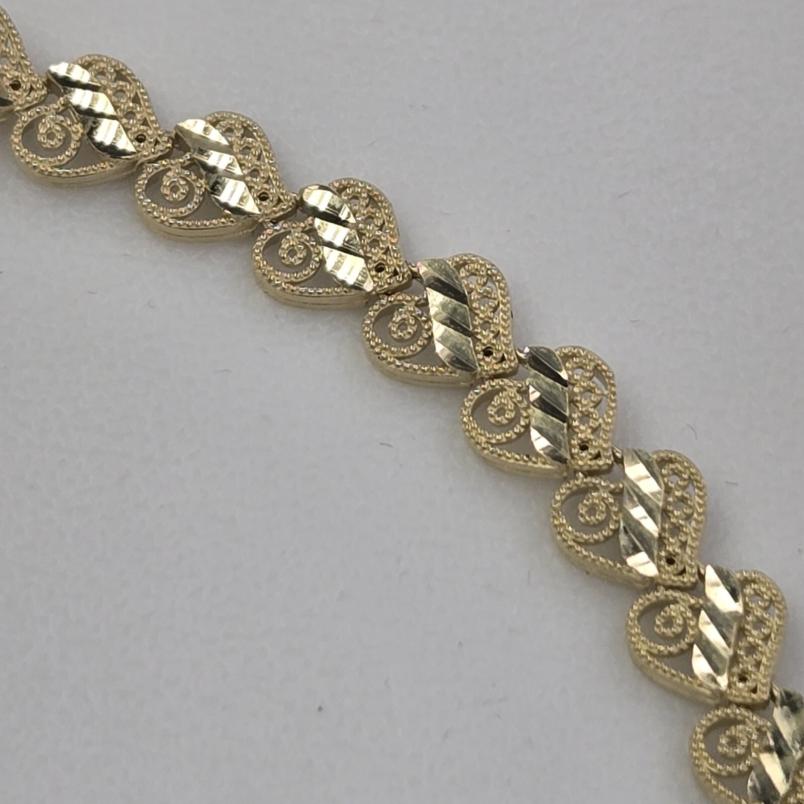 Solid 10k yellow gold hearts Bracelet 8 Inches Long Diamond Cut Large Size