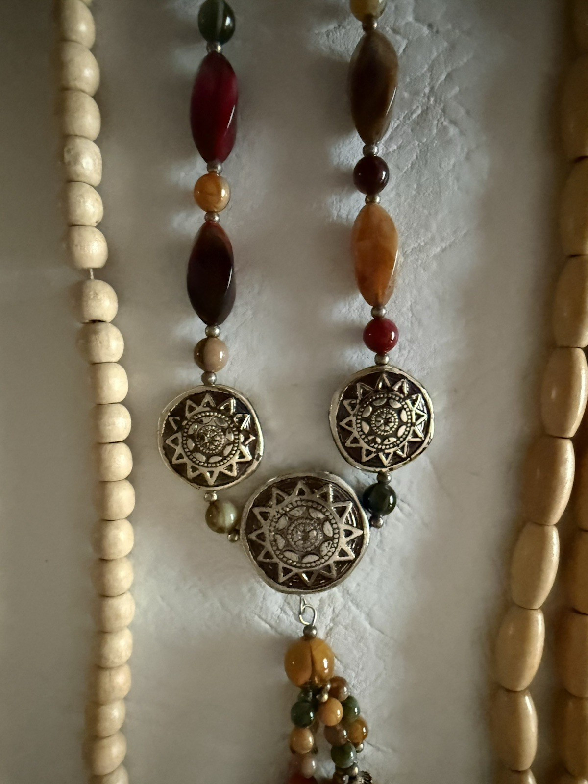 Lot of 10 necklaces, mostly wood beads, some Lucite, ethnic look earth tones