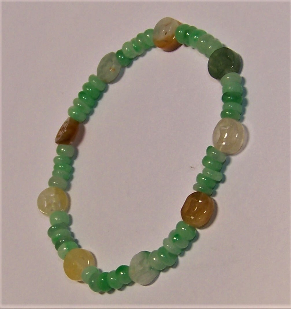 Brand new multi-color Jade elastic Bracelet, 7-8 inches long.