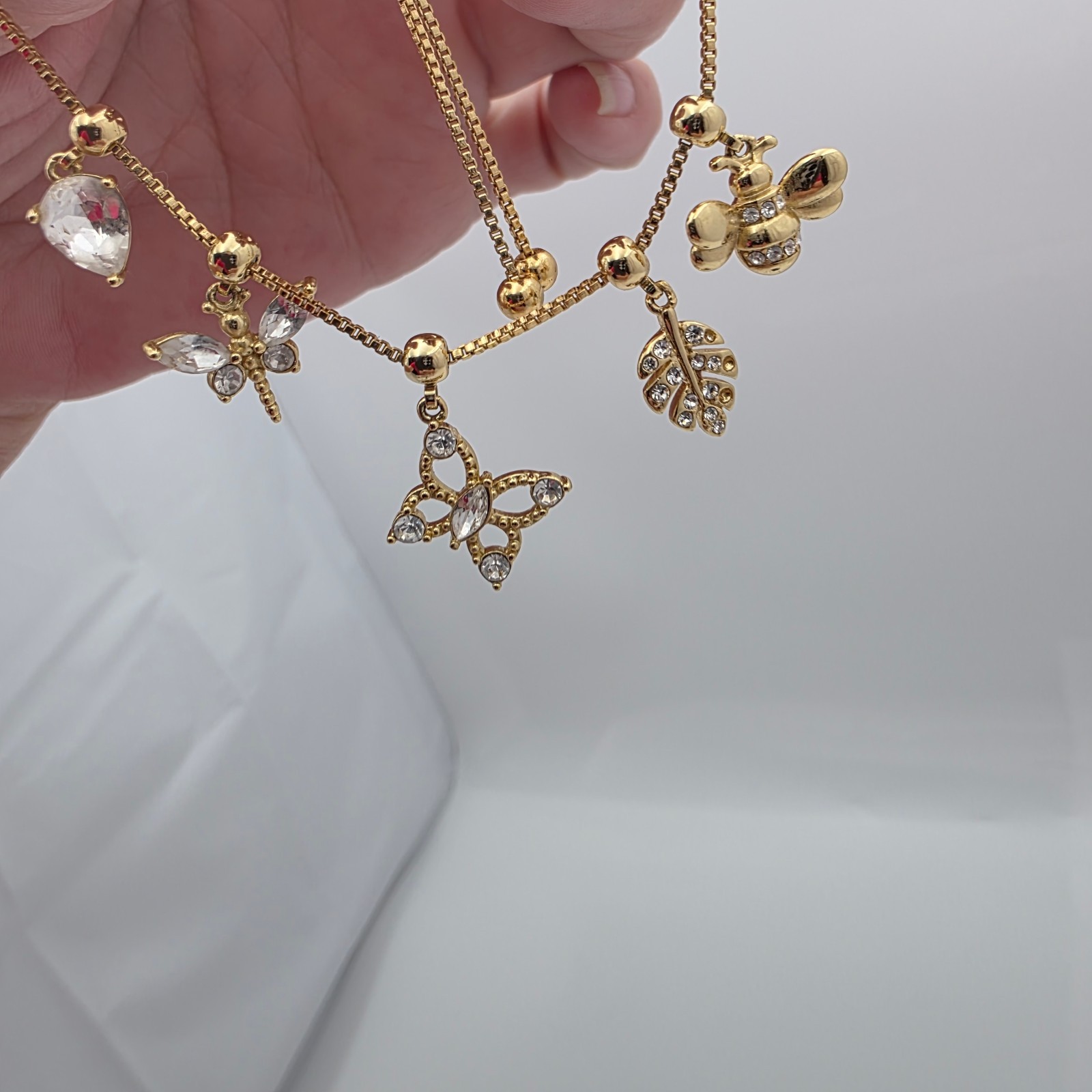 Brilliance Gold Tone Crystal Charm Slider Bracelet Butterfly Bee Leaf w/ Box