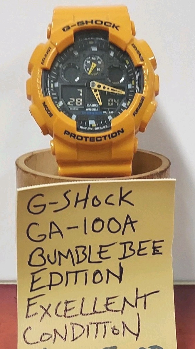 Casio G-SHOCK GA-100A Yellow Analog-Digital Quartz Shock Resist 200m