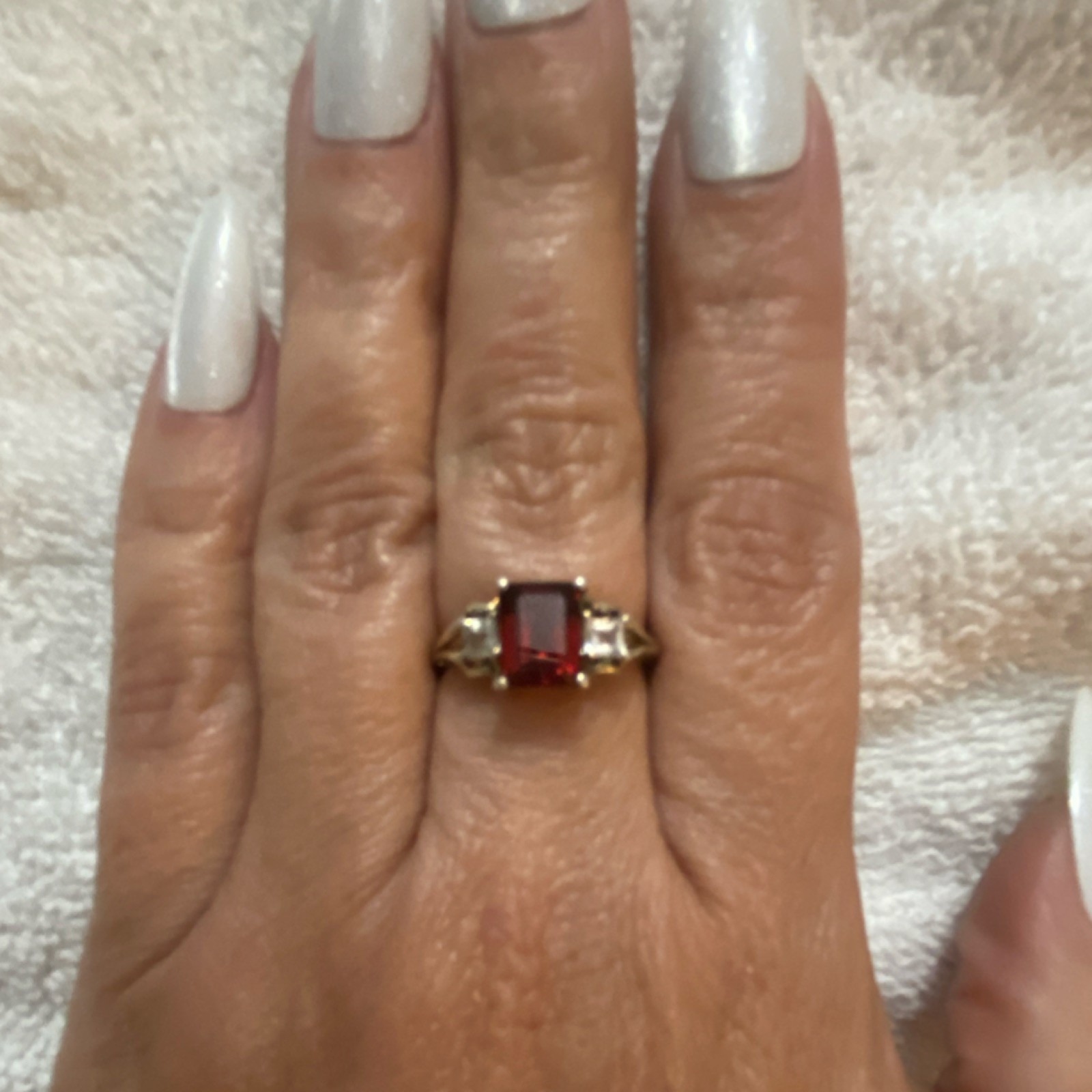 925 s.s. Emerald cut garnet with clear square stones 6 1/2 size