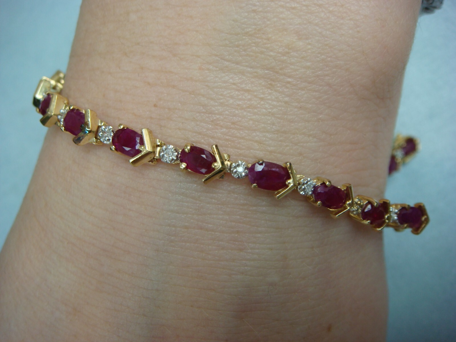 14 KT YELLOW GOLD GENUINE RUBY AND DIAMONDS TENNIS BRACELET 8.8 GRAMS 6.5 “