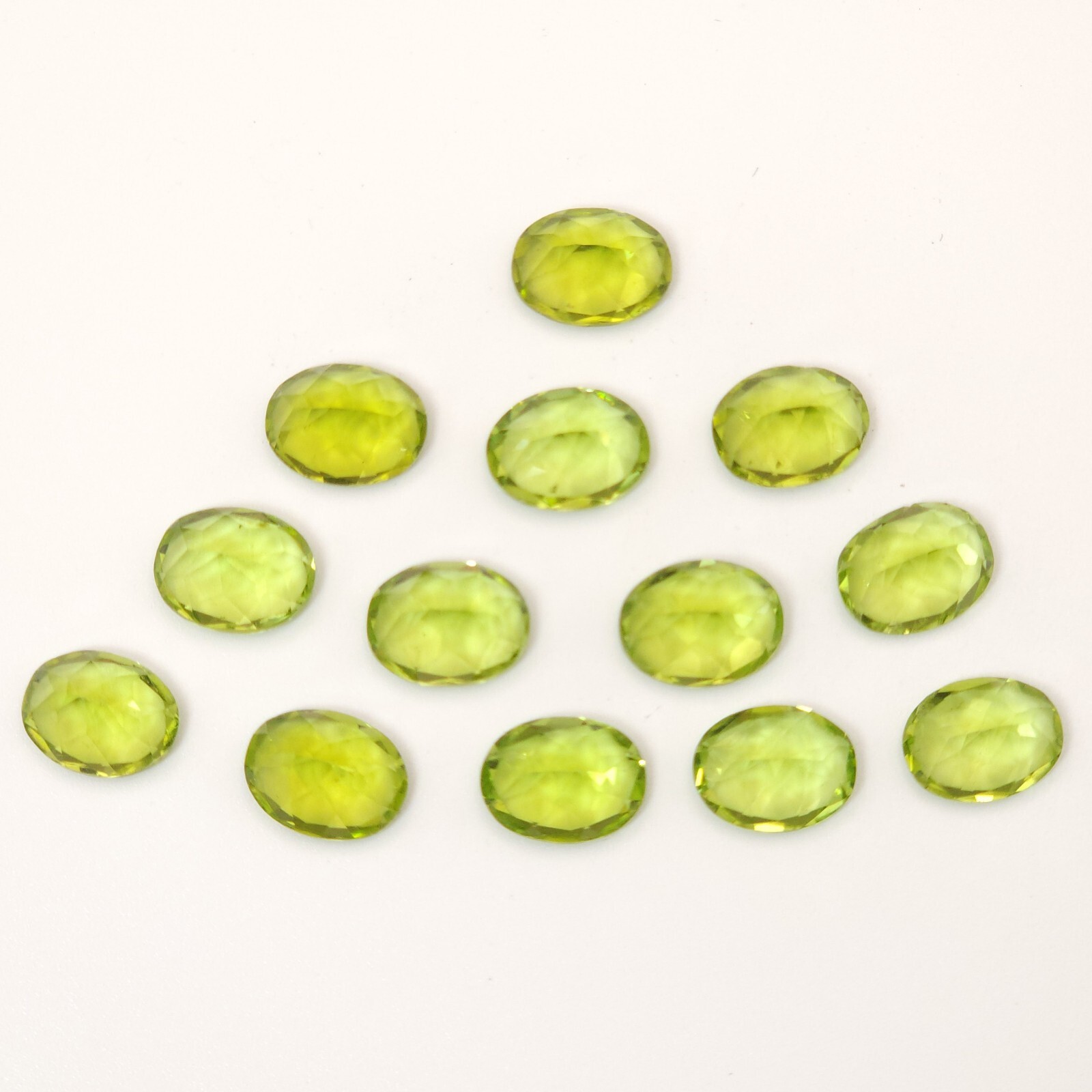 Set Of 13 2CT Natural light green Peridot Stones 9x7mm Oval Shaped 26CTW