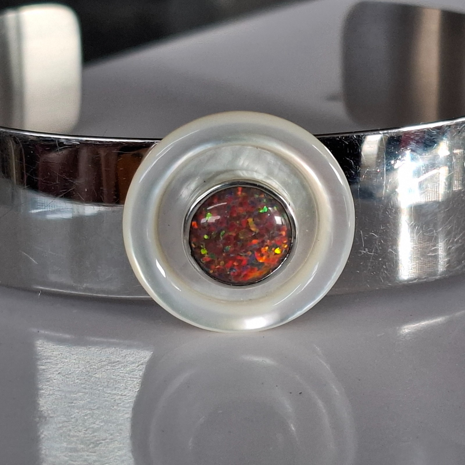 – Beautiful synthetic opal head set in silver for Charlotte 21 –