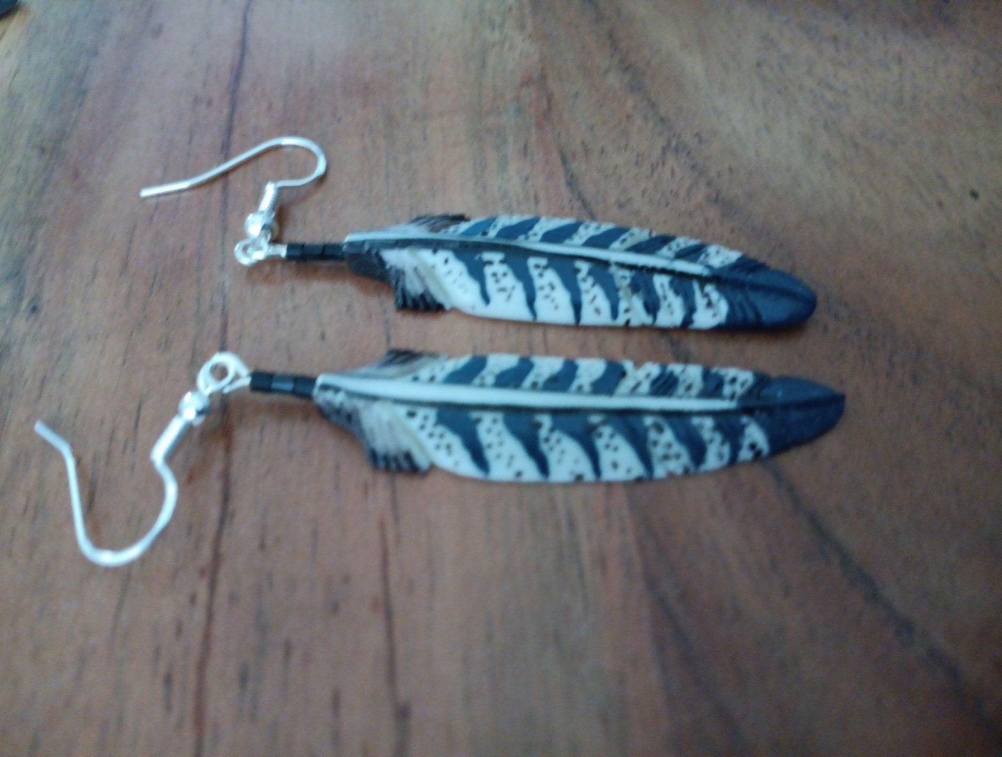 HANDMADE CARVED WATER BUFFALO BONE FEATHER EARRINGS AĹASKA BONE YARD COLLECTION