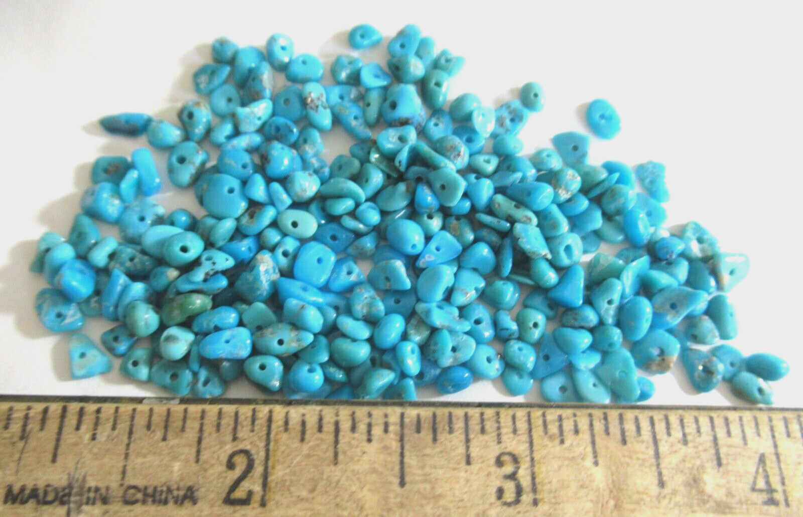 SLEEPING BEAUTY TURQUOISE 1/2 OZ DRILLED NUGGETS 4 X 3mm TO 7 X 4mm #606
