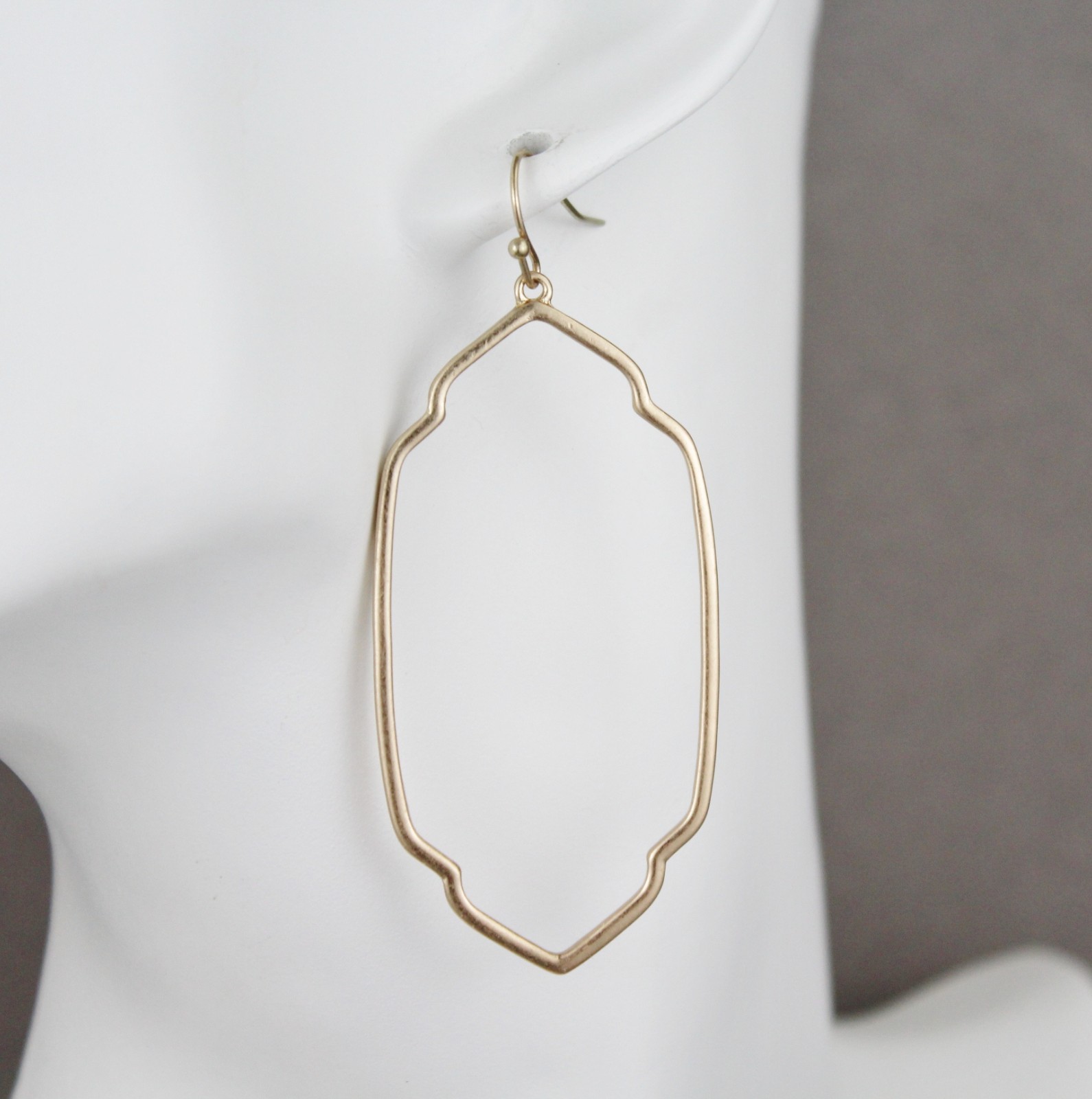 Gold oval teardrop earrings dangle cutout filigree oval outline 2.75″ long