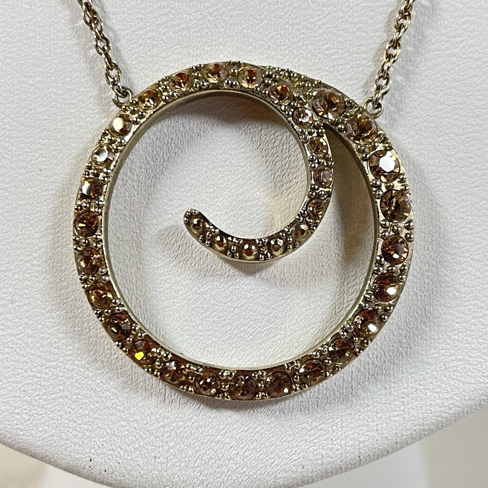 Vintage Monet Gold Tone Topaz Rhinestone Swirl Circle Pendant Necklace Chain 16″