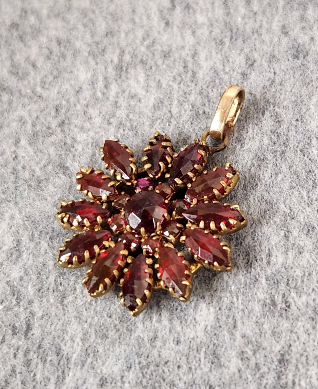 Vintage Gilt Metal Bohemian Red Glass Stone Starburst Floral Pendant 1 3/8″ Tall