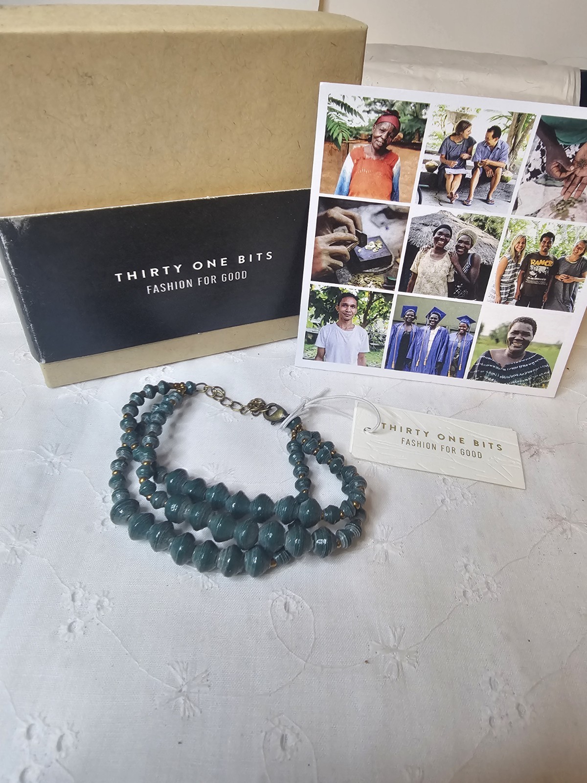 Thirty One Bits multi-strand green paper bead Bracelet Made In Uganda