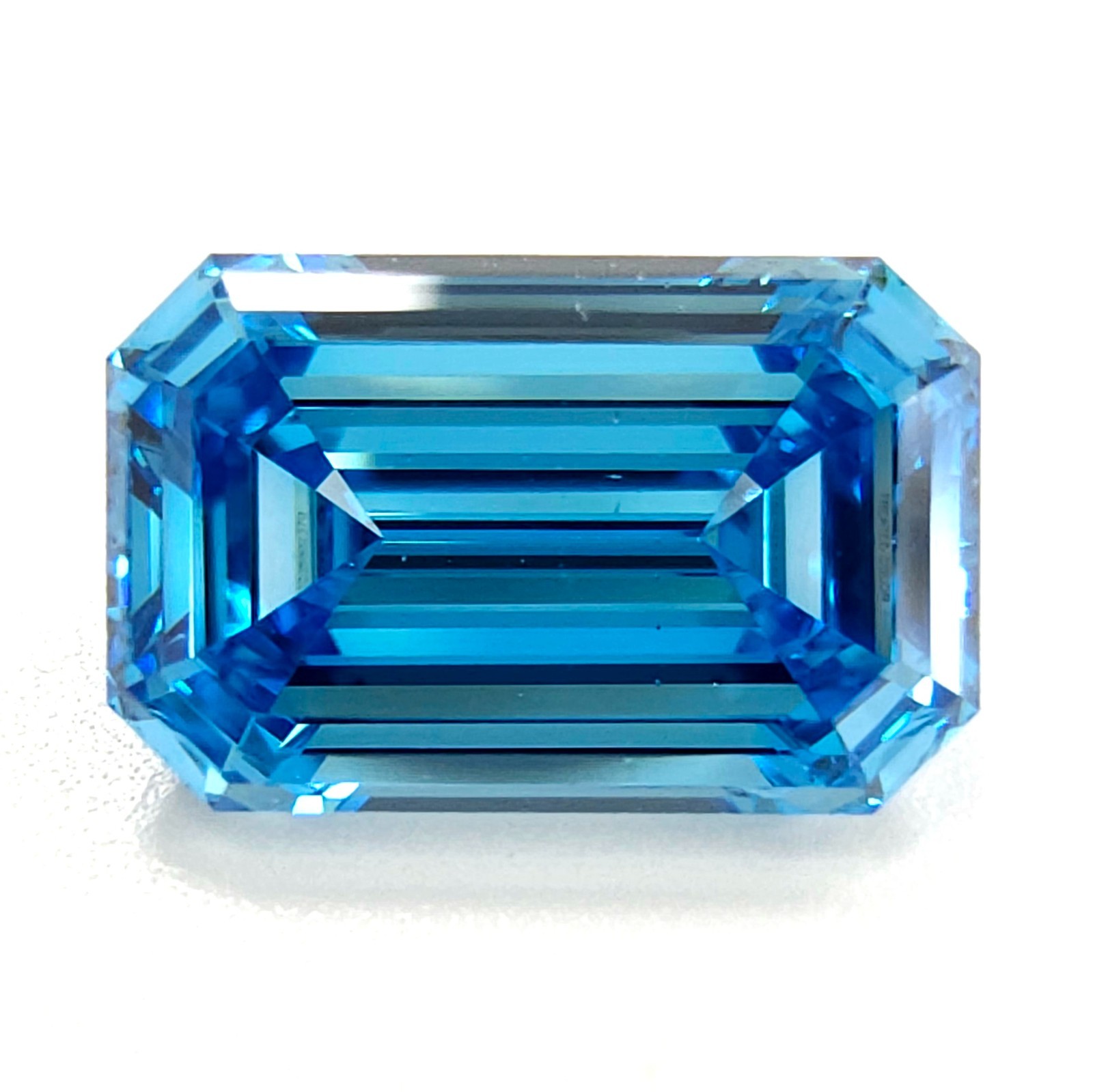 0.78 Carat Fancy VIvid Blue Diamond GIA Certified VS1 Emerald Cut