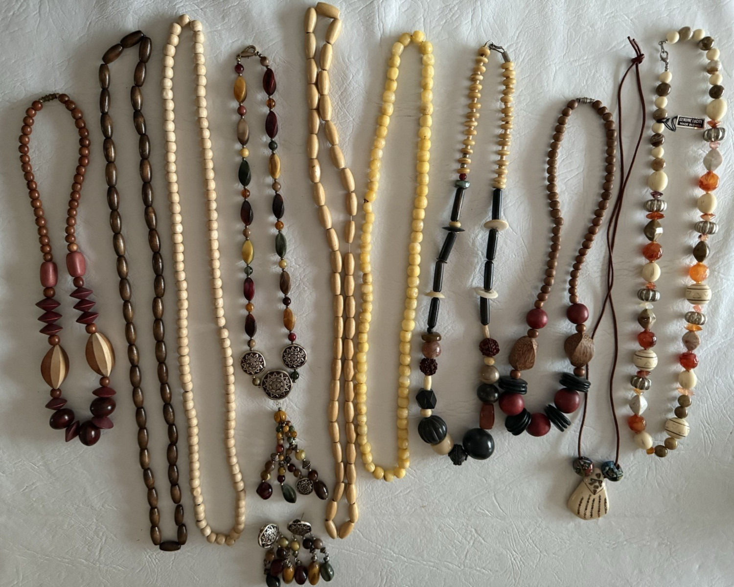 Lot of 10 necklaces, mostly wood beads, some Lucite, ethnic look earth tones