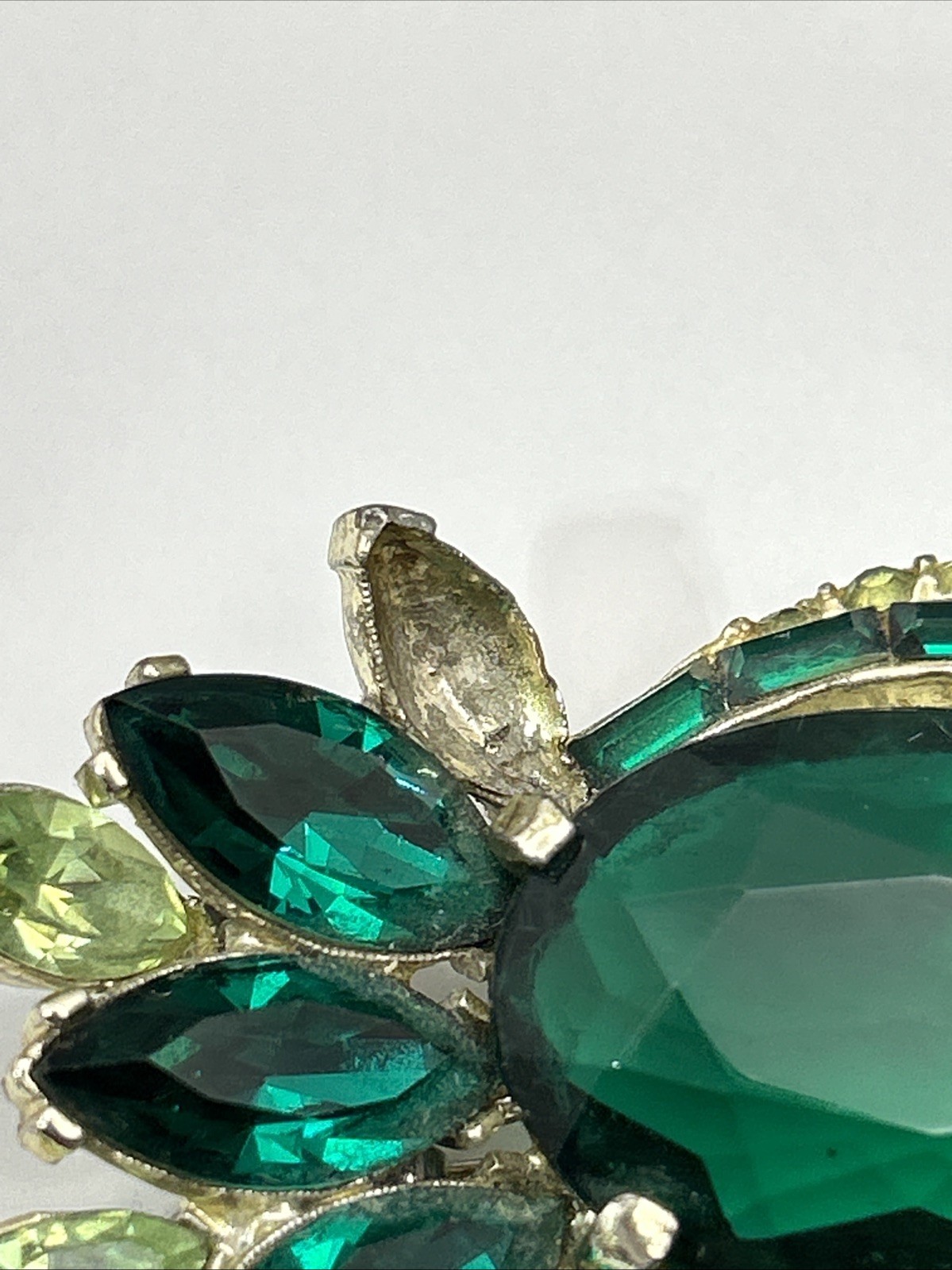 Vintage Designer Signed Pell Emerald Green Prong Set Pave and Rhinestone Brooch