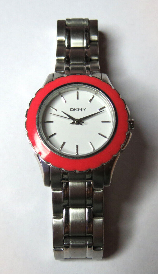 NICE WOMENS DKNY QUARTZ SPORT 5 ATM PINK BEZEL WATCH FRESH BATTERY RUN’S,