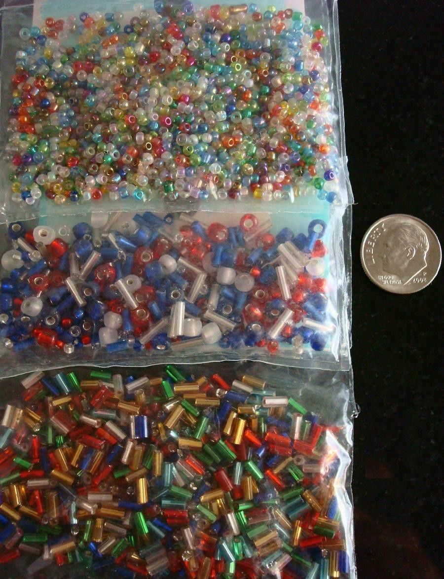 Hundreds of glass seed beads and bugle beads assortment 3 bags of beads gbs046
