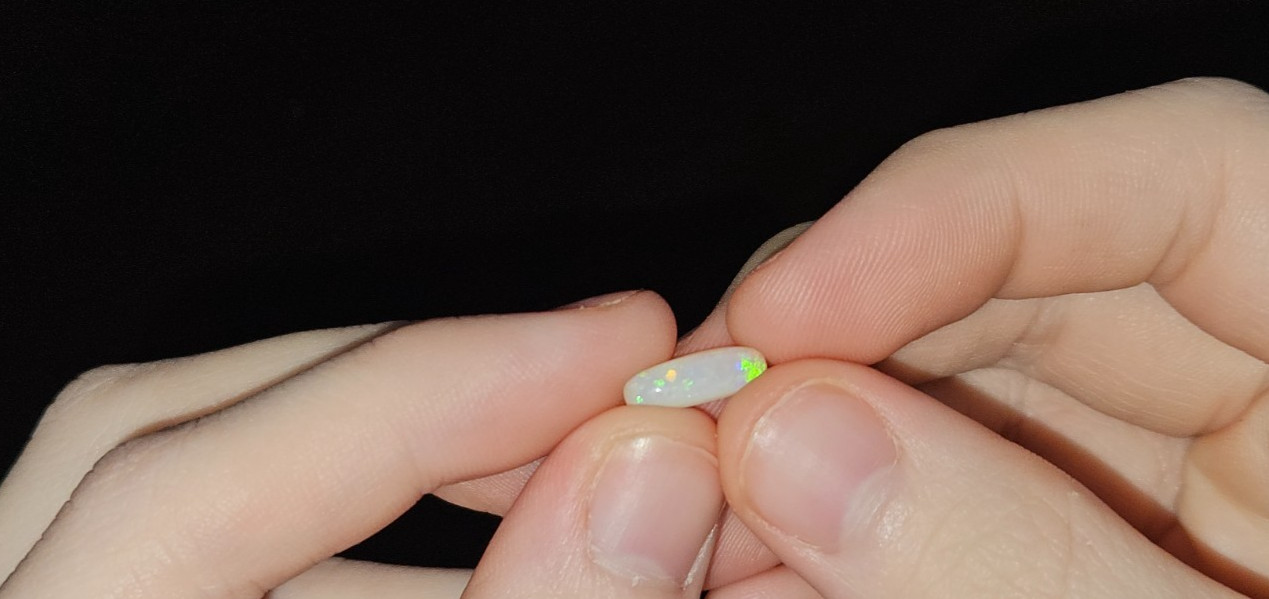 Long Cushion Cut Natural Crystal Opal. 1.18 Carats 12mm x 4mm x 3mm