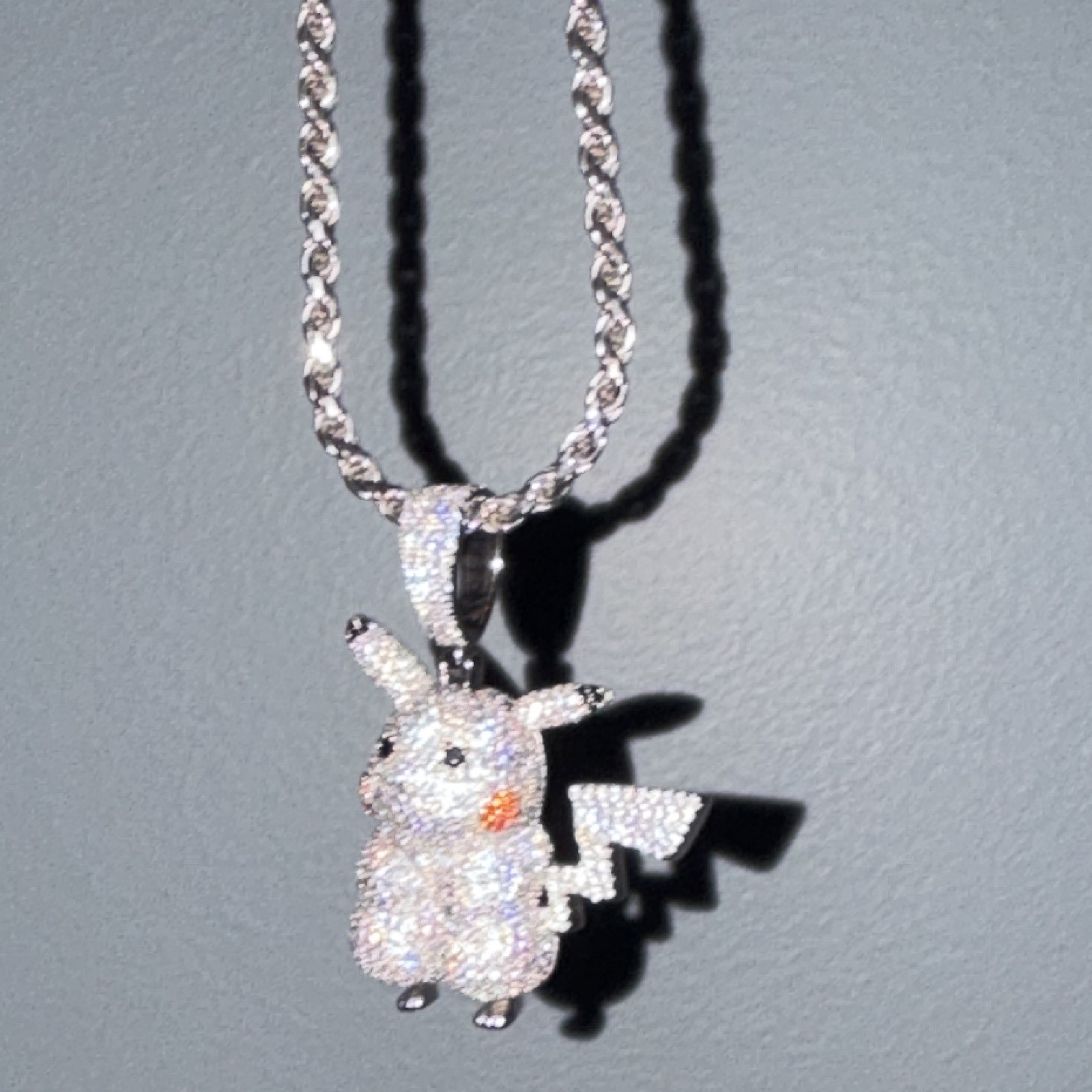 Iced out Pikachu pendant with moissanite diamonds and 92.5 silver roper chain