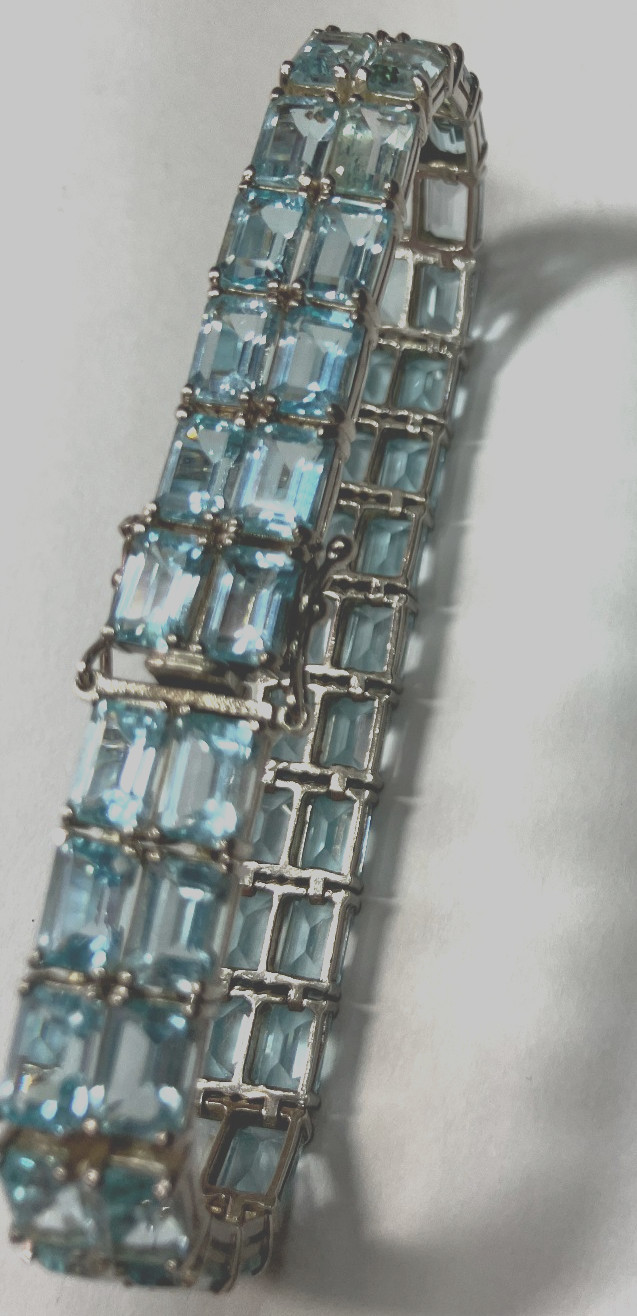 8” TENNIS BRACELET -ADI 925 STERLING SILVER – 40 EMERALD CUT TOPAZ STONES -NICE!