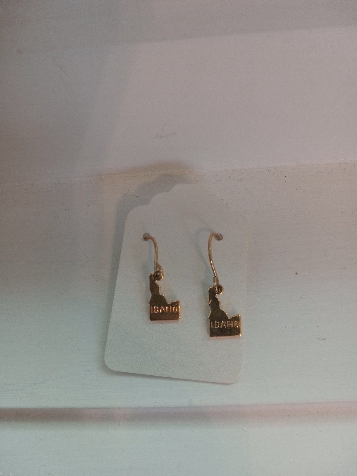 Idaho gold color earrings, brand unknown, gold in color,