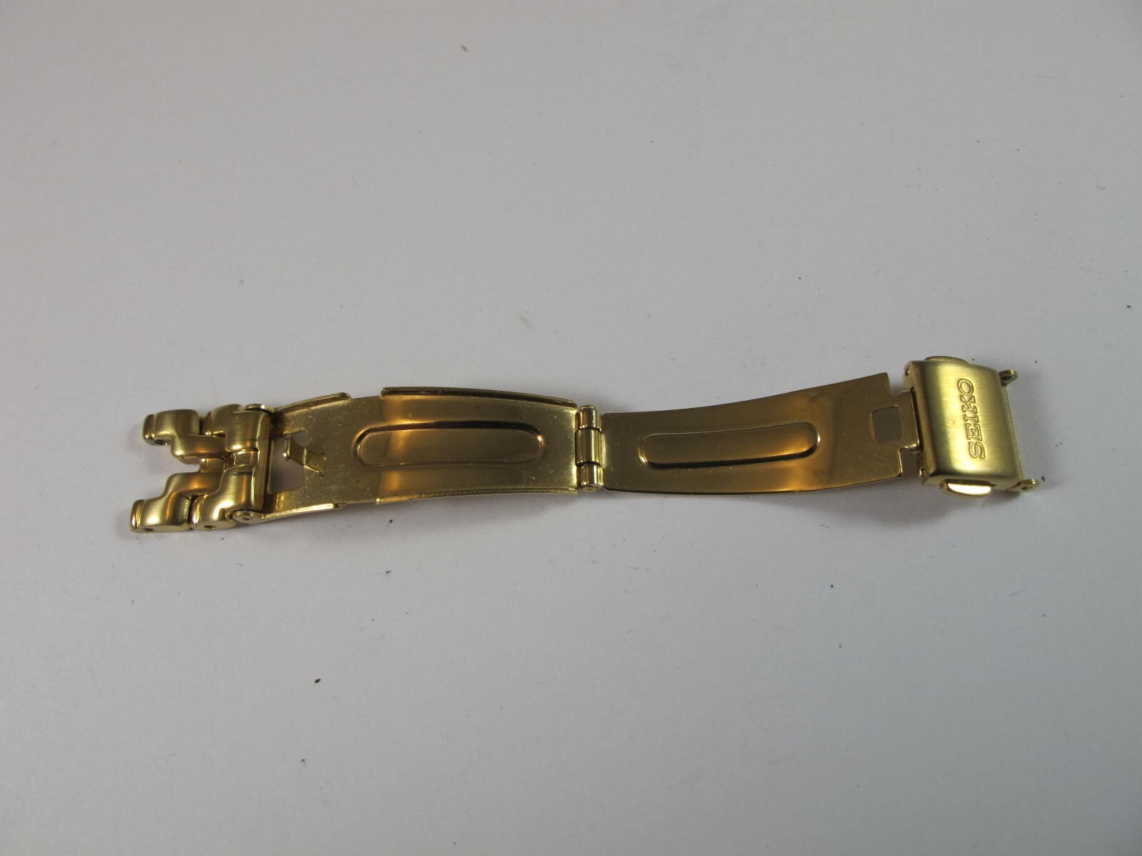 SEIKO LADIES SMALL PUSH BUTTON GOLD TONE DEPLOYANT CLASP