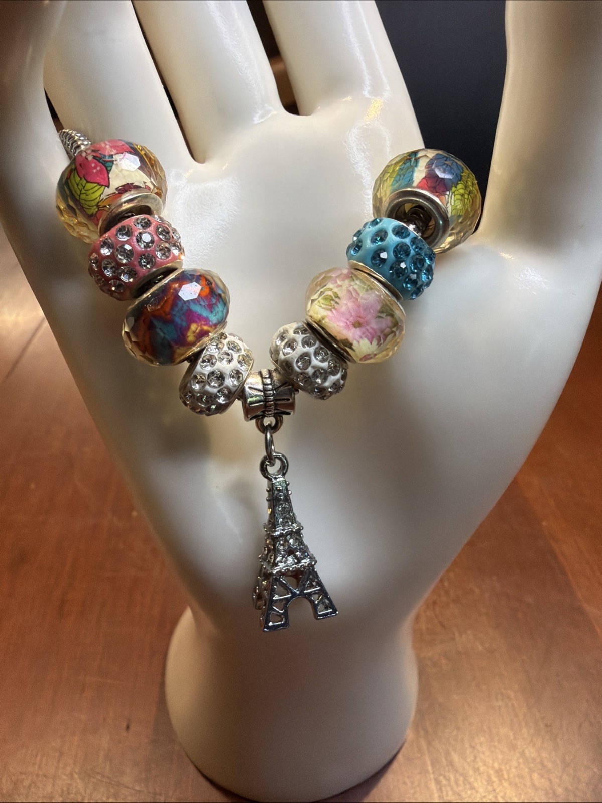 Eiffel Tower Charm Bracelet w/Crystal Beads, Flower & Leaf Designs In Resin