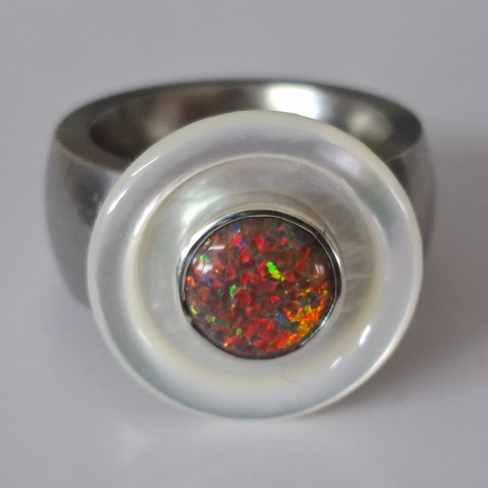 – Beautiful synthetic opal head set in silver for Charlotte 21 –