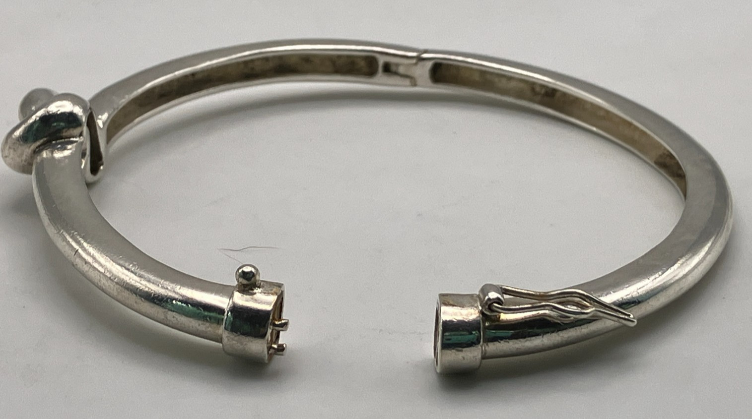 Sterling Silver Heavy Love Knot Hinged Bangle with Magnetic Closure Safety Latch