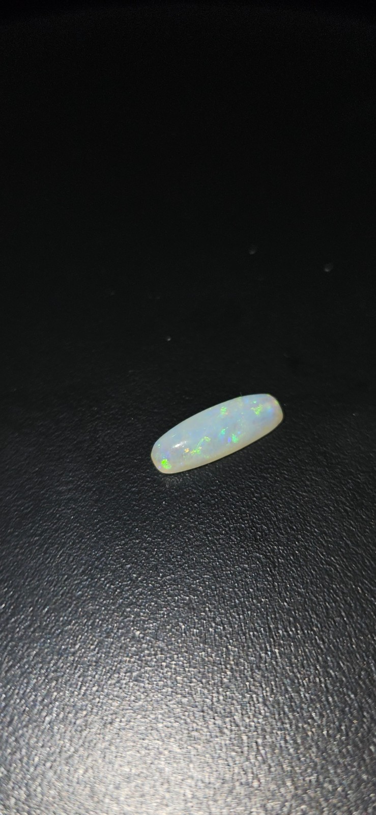Long Cushion Cut Natural Crystal Opal. 1.18 Carats 12mm x 4mm x 3mm
