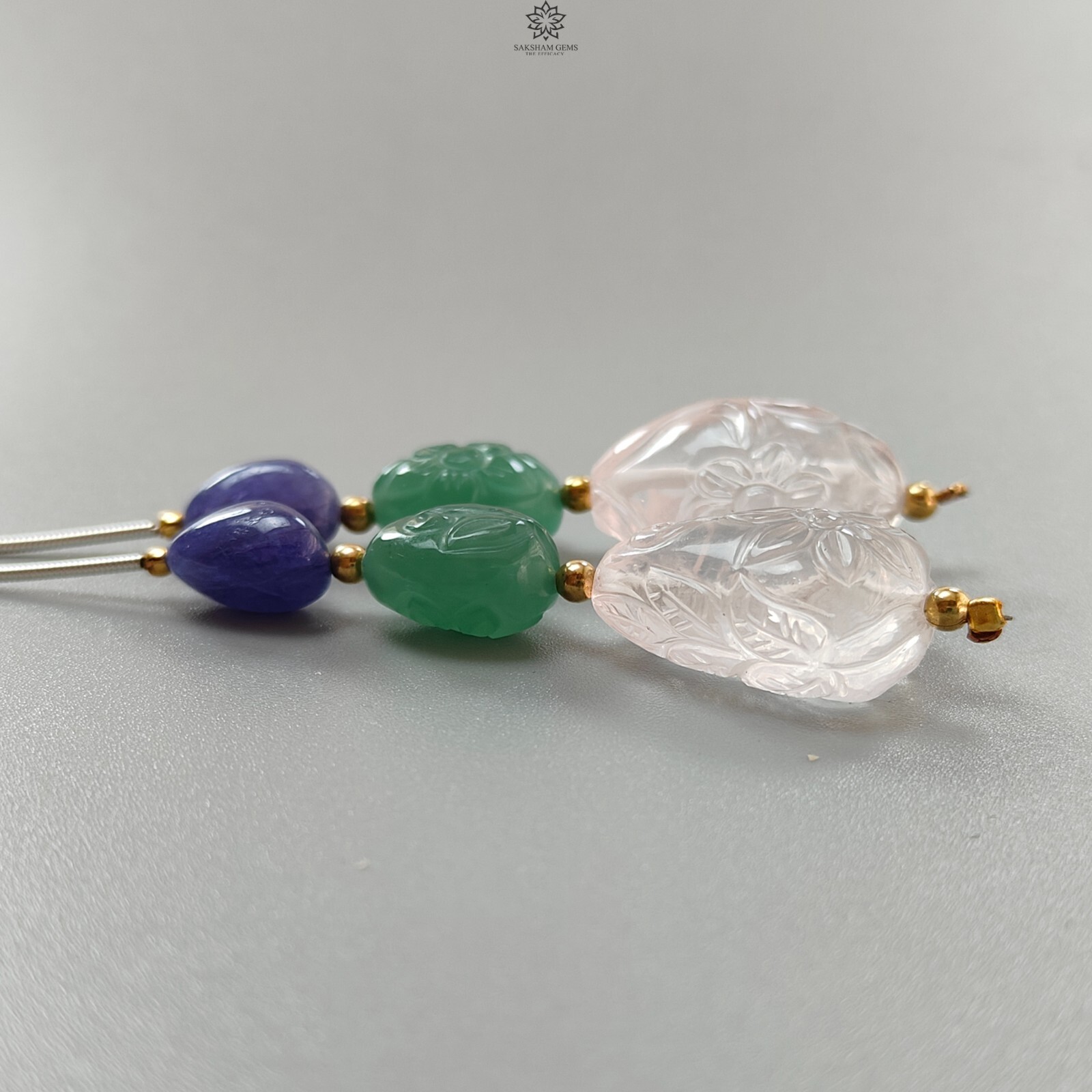 97.70cts Green Quartz & Blue Tanzanite Carved Fancy Beads 12*9mm – 24*16mm 2.30″