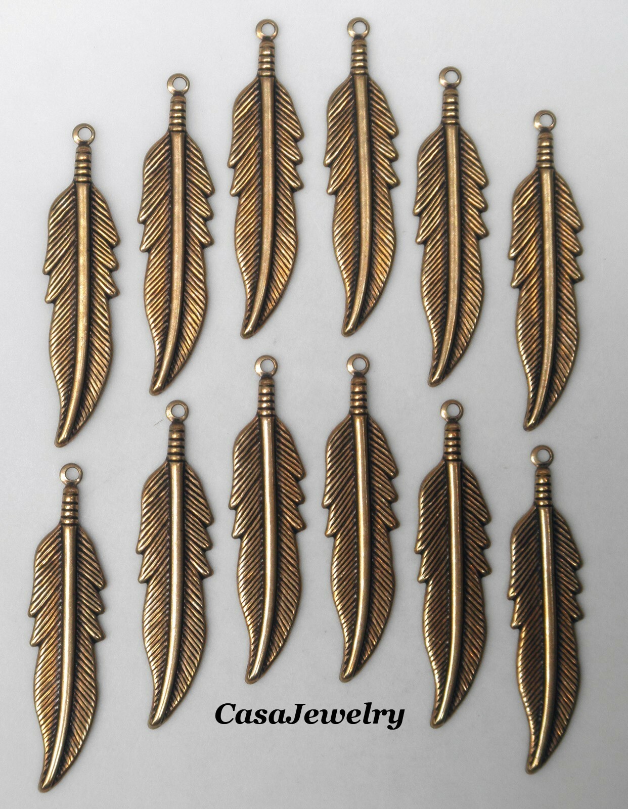 #1146 MEDIUM ANTIQUED GOLD FEATHER DROP W/TOP HANG RING – 12 Pc Lot