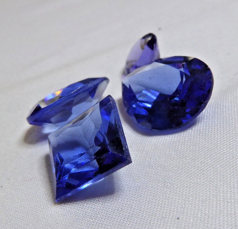4 HUGE LAB CREATED TANZANITES