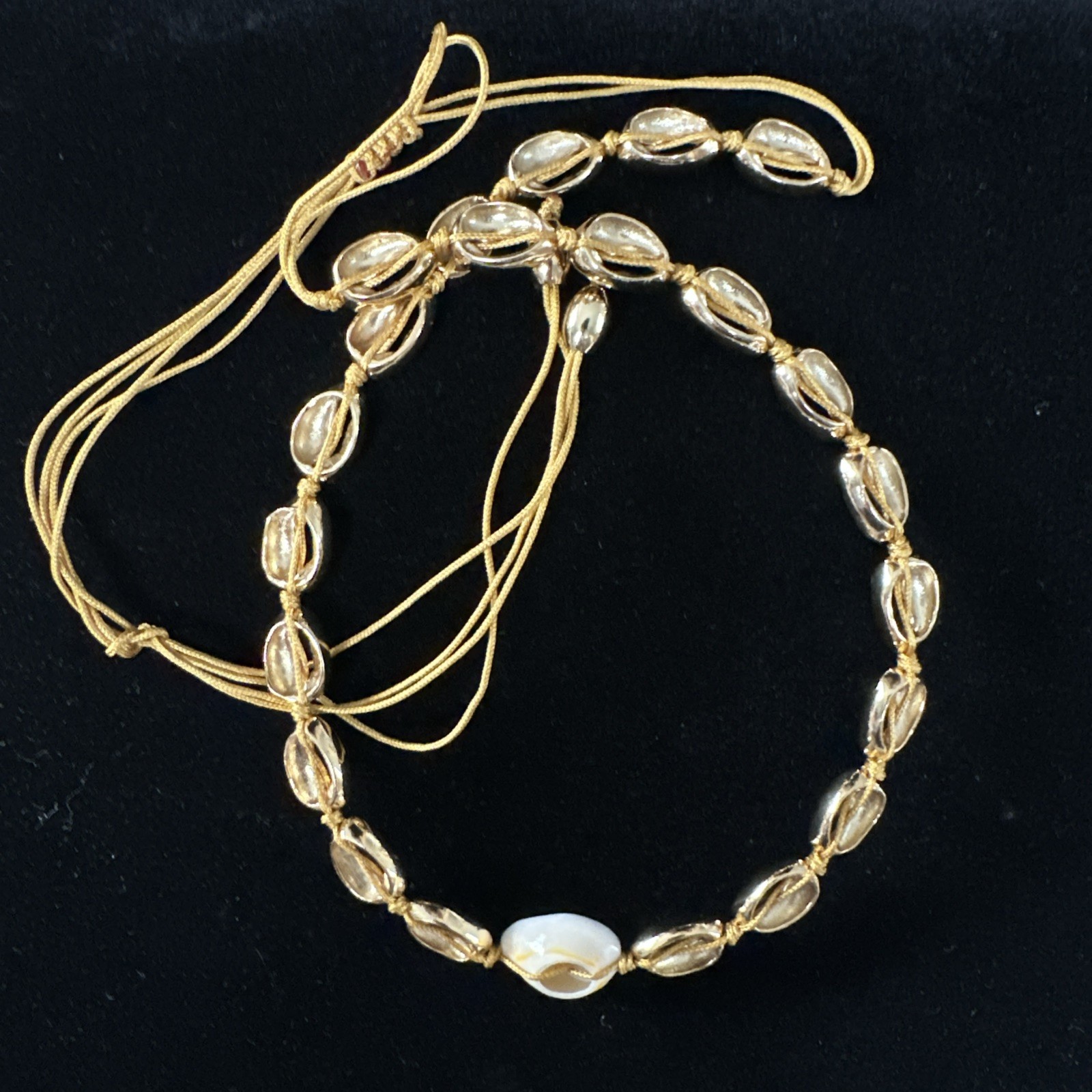 gold cowrie shell choker necklace w/ single white shell accent adjustable cord