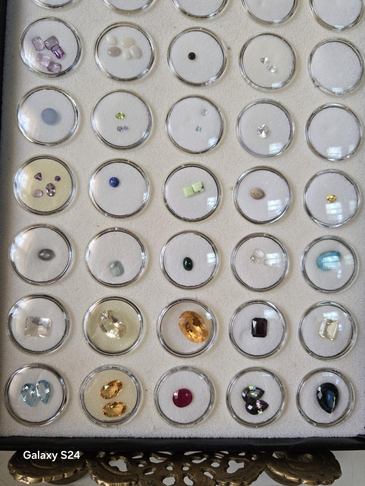 Lots Of Loose Faceted Mixed Colors Gemstones In A Display Case- ** ESTATE…