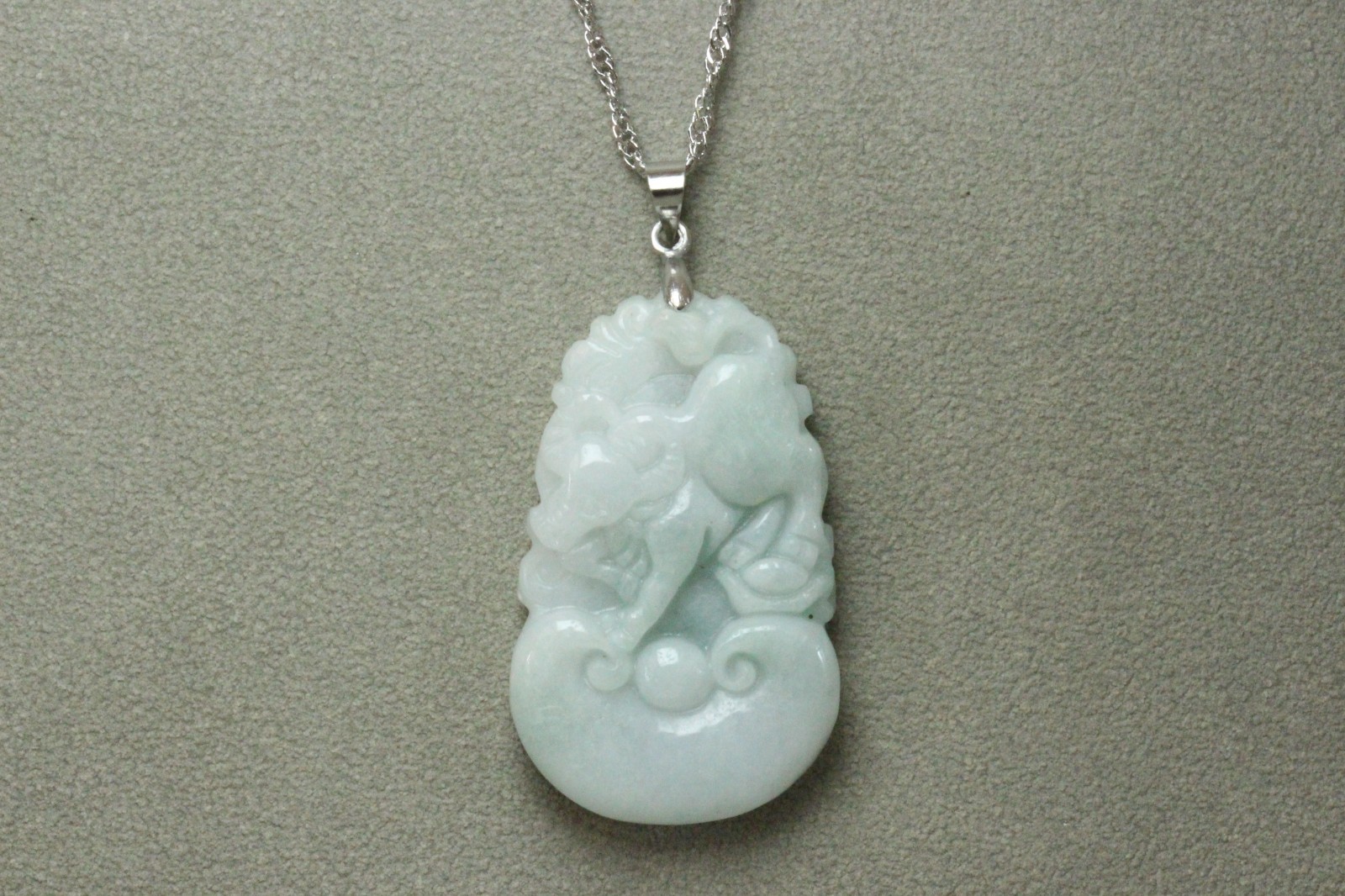 Natural White green A Jadeite jade Hand-Carved Cow (Chinese Zodiac) Pendant