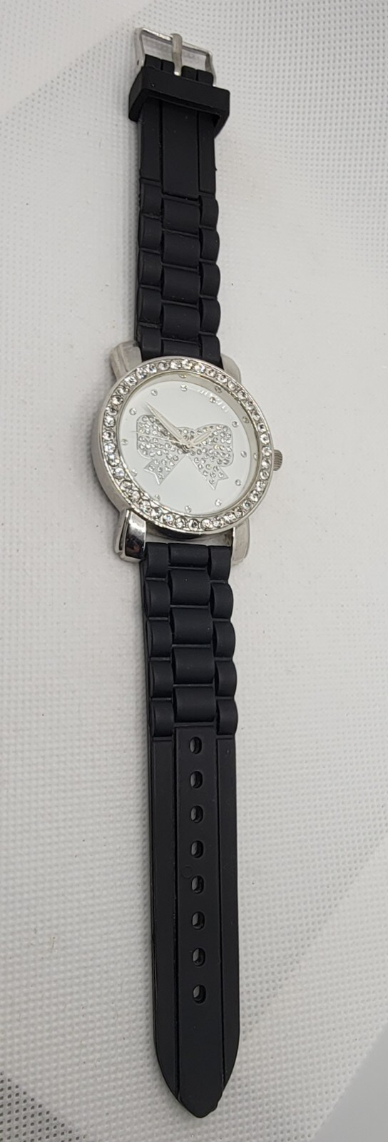 Ladies Casual Round Studded Bow Dial Silver Tone Black Poly Band Analog Watch J6