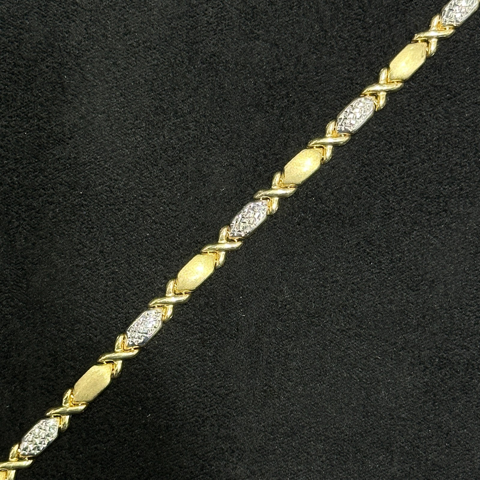 XO Bracelet 10k Gold Fancy Diamond Cut Woman