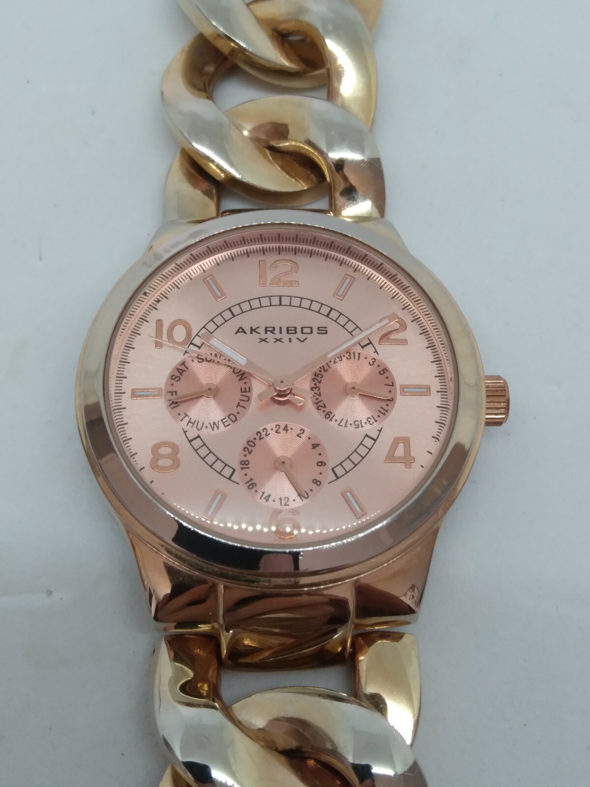 Akribos XXIV AK531RG Women’s 38mm Rose Tone Crystal Accent Multifunction Watch