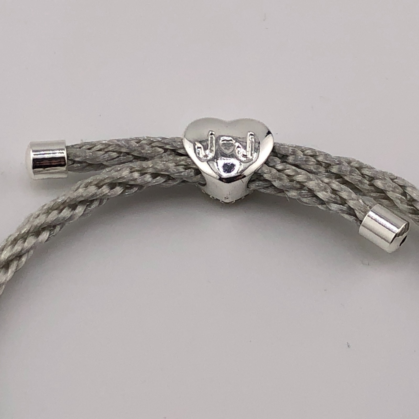 Joma Jewellery Bracelet Silver Tone & Sparkle Heart Adjustable Cord Party Disco