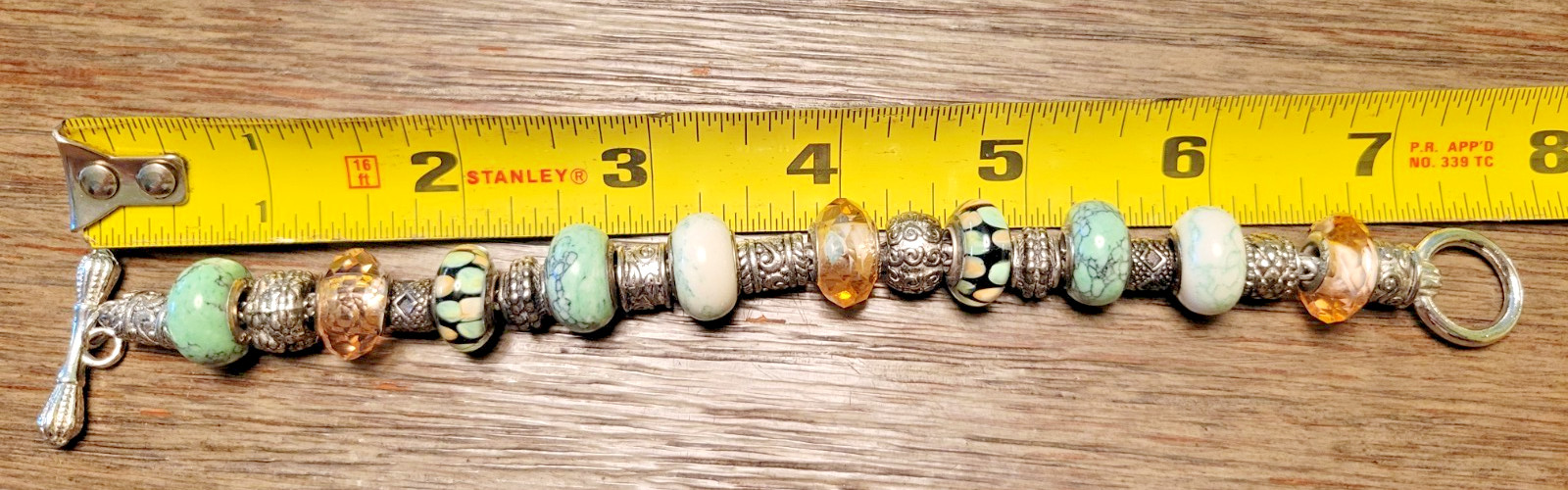 Beautiful Silver Toned Bracelet With (9) .925 Sterling Silver Beads.