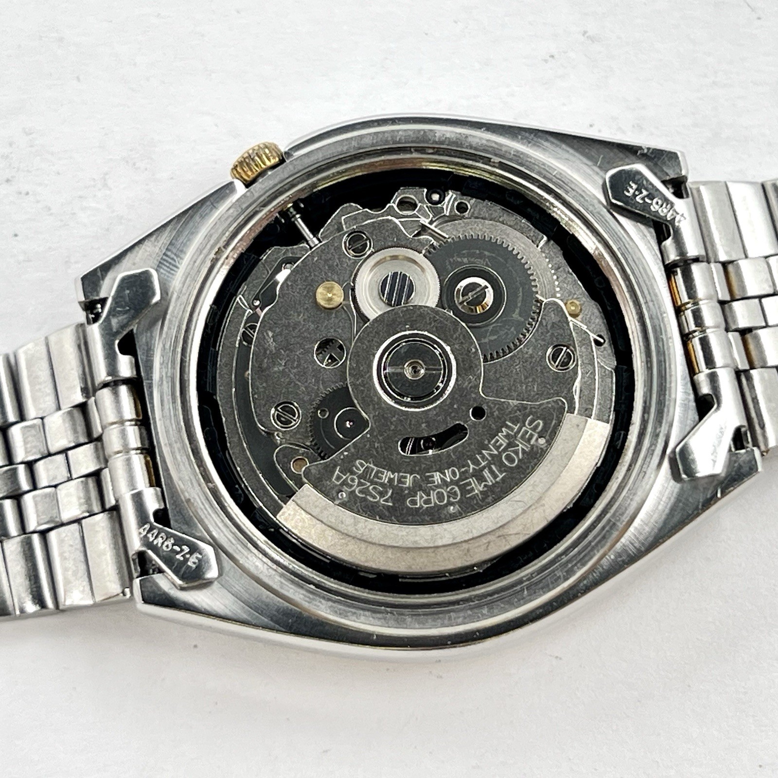 Seiko 5 Automatic Day/Date Steel Gold Tone White Teaked Dial 38mm Watch SNX166