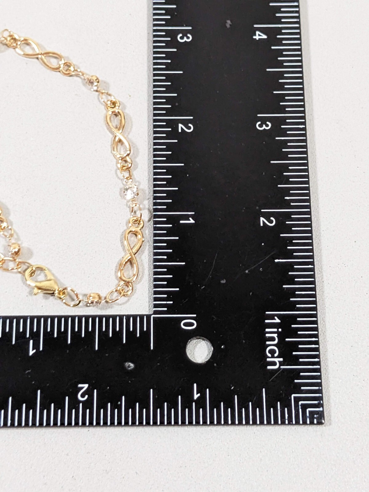 Gold Tone Infinity Clear Crystal Tennis Bracelet 10 inches