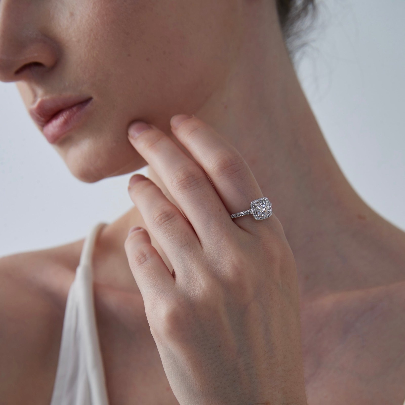 Platinum Plated Moissanite Halo Engagement Ring in 925 Sterling Silver