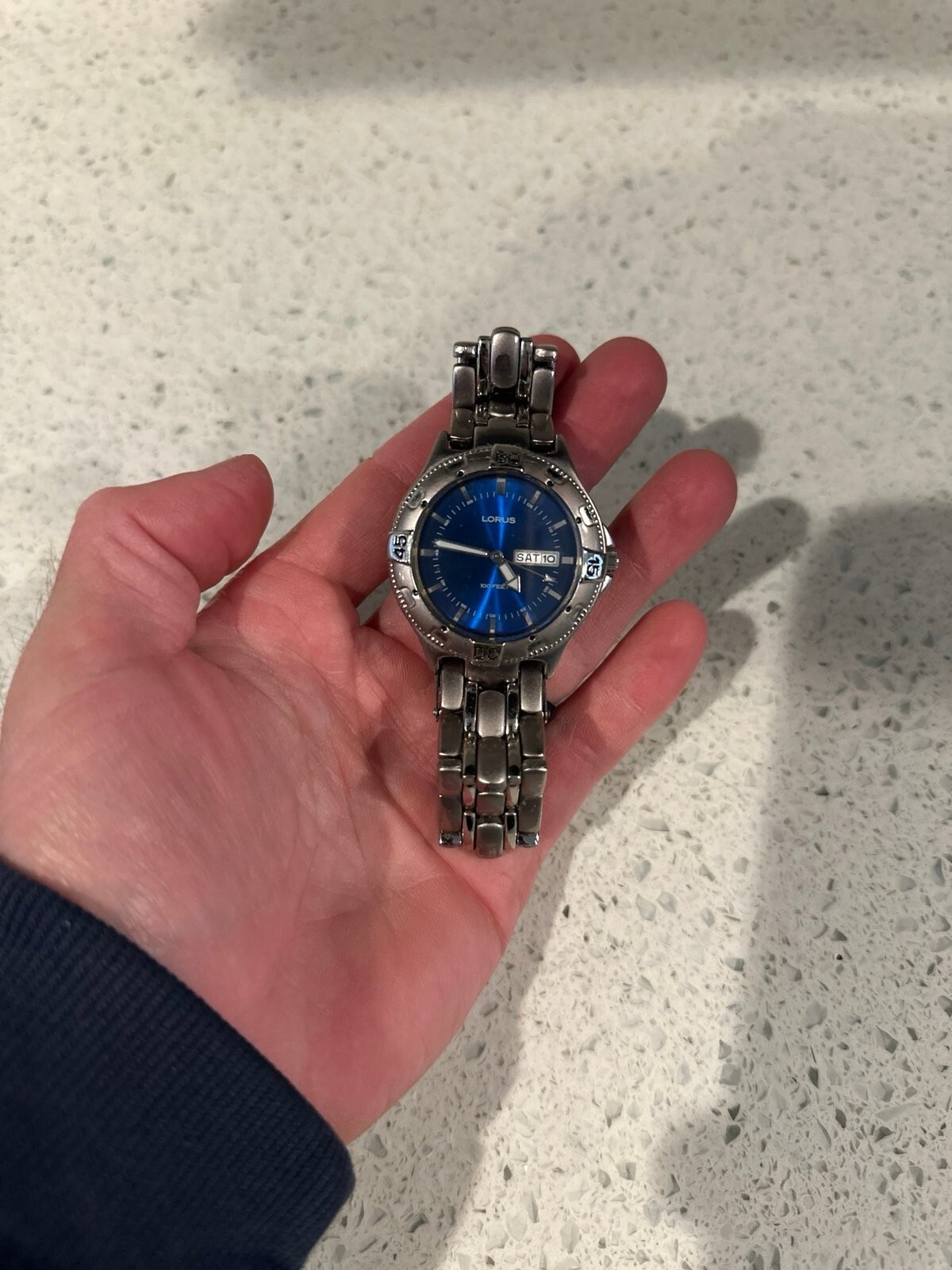 Lorus Silver Tone Blue Face Day Date Indicator GlowHour Minute Hand Watch LA0393