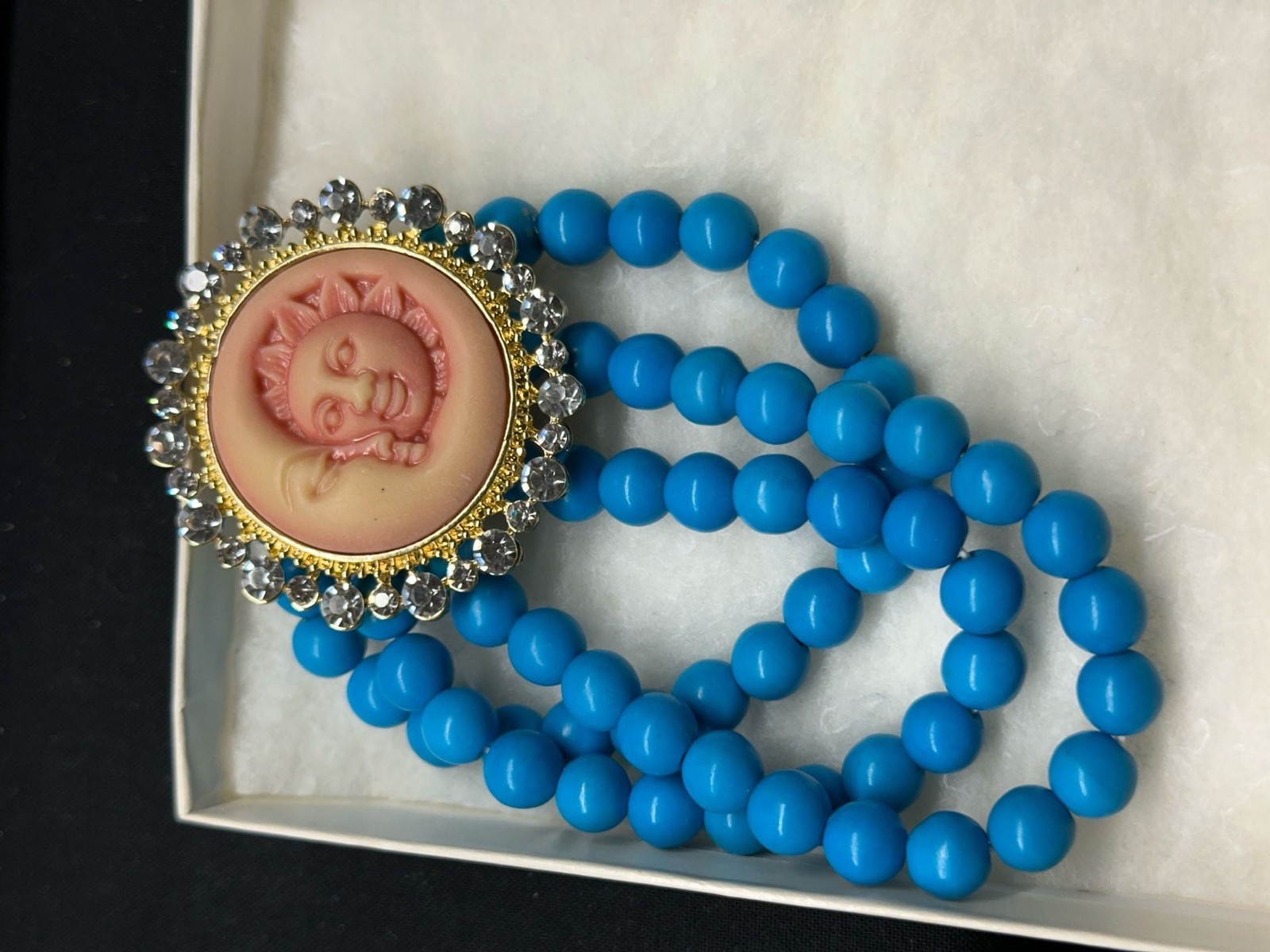 Three-Strand Blue Beaded Statement Necklace with Celestial Sun Cameo Pendant