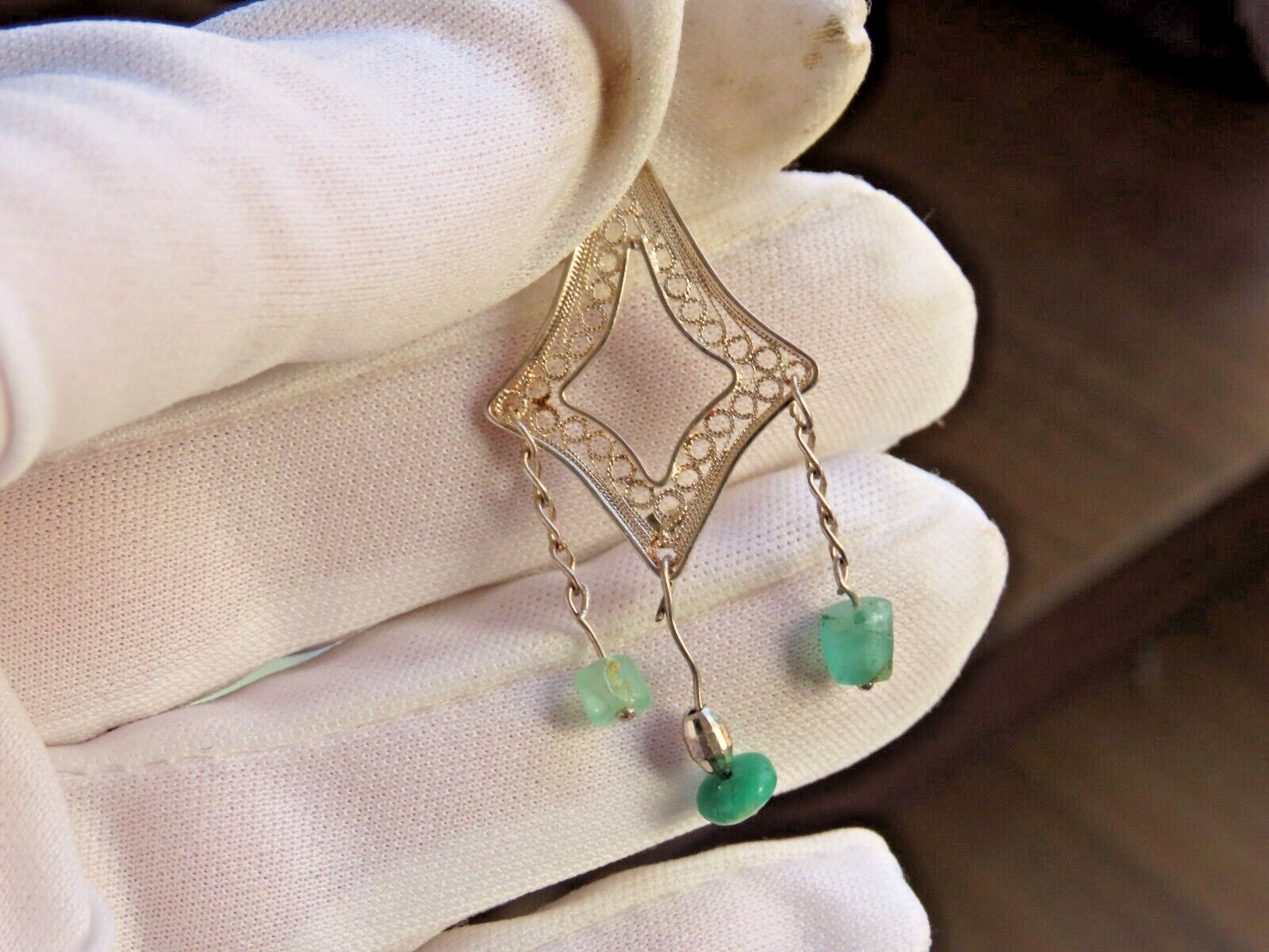 Handmade filigree silver pendant with Colombian emeralds