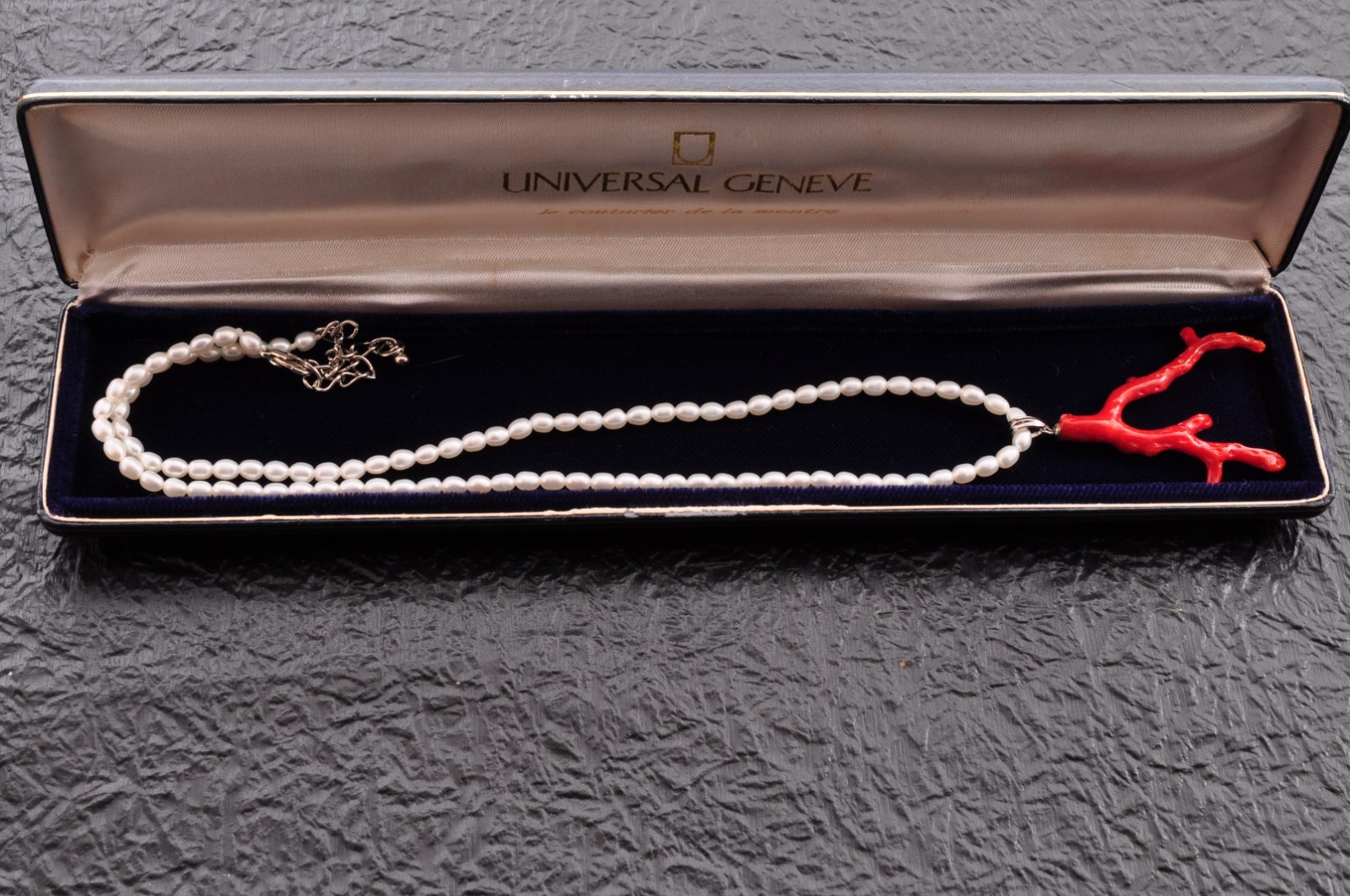 Sterling silver clasp, red coral and pearl pendant (total 54.0ct) Certification.