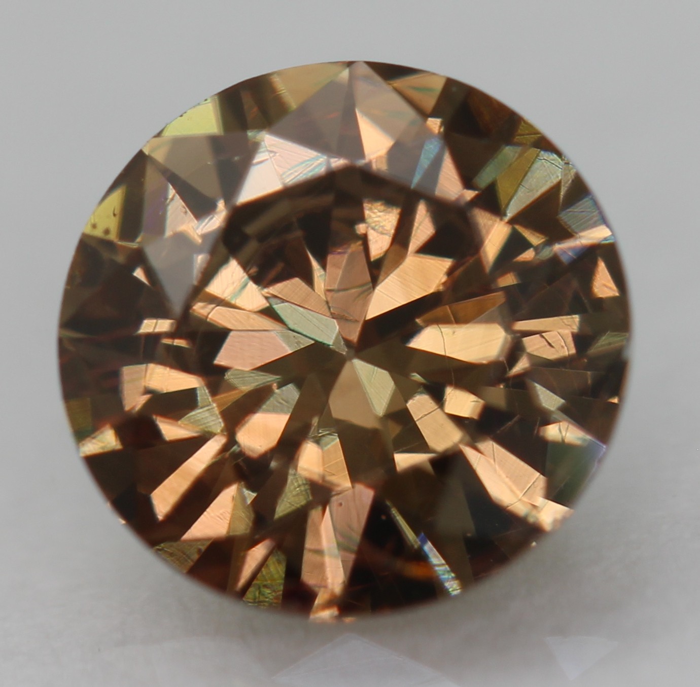 0.59 Ct Yellow Brown VVS2 Round Brilliant Natural Enhanced Diamond 5.74mm VIDEO