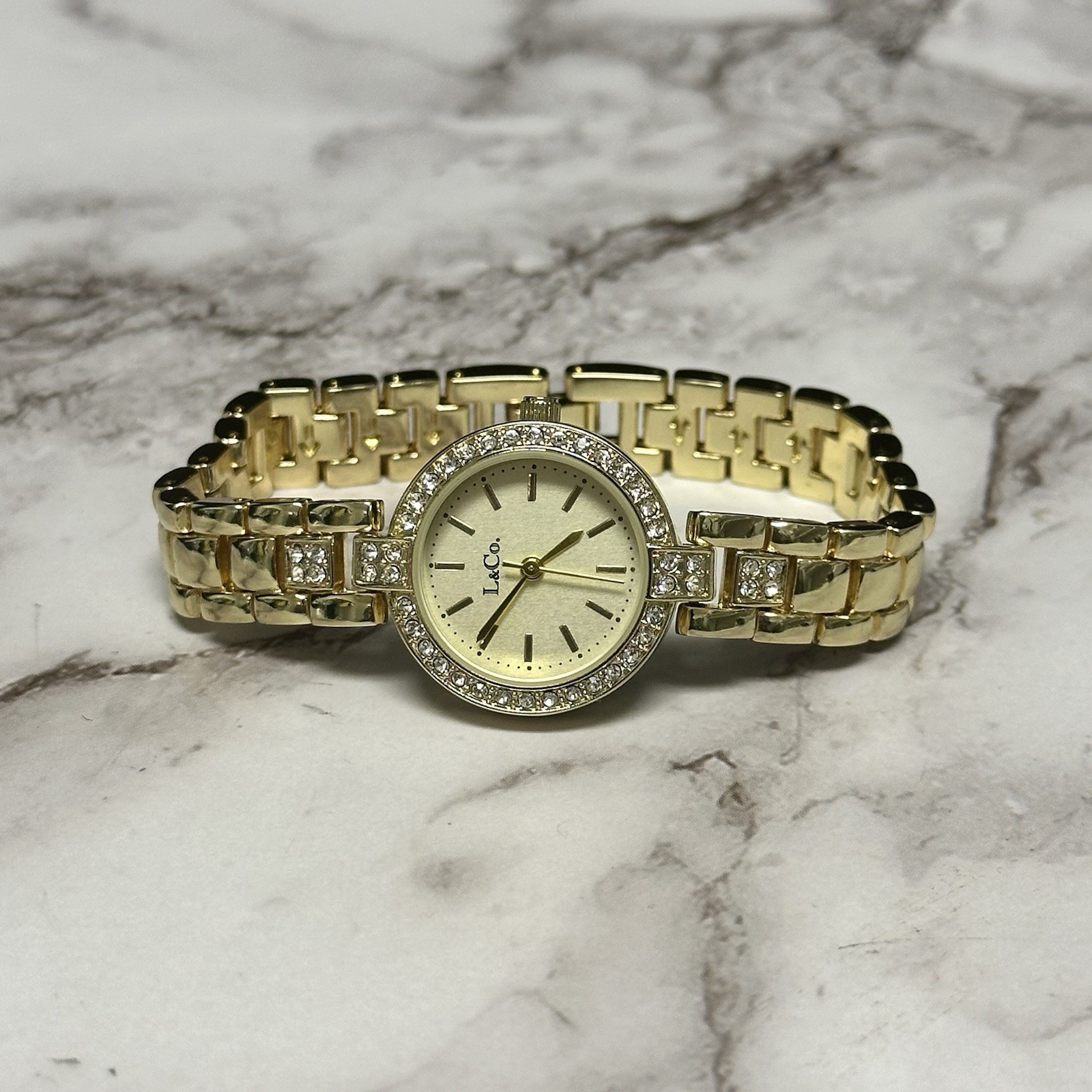 L & Co Watch Women Gold Tone Round Dial Crystal Bezel New Battery 7.25″